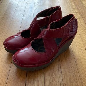 Fly London Red Patent Leather Crisscross Wedges